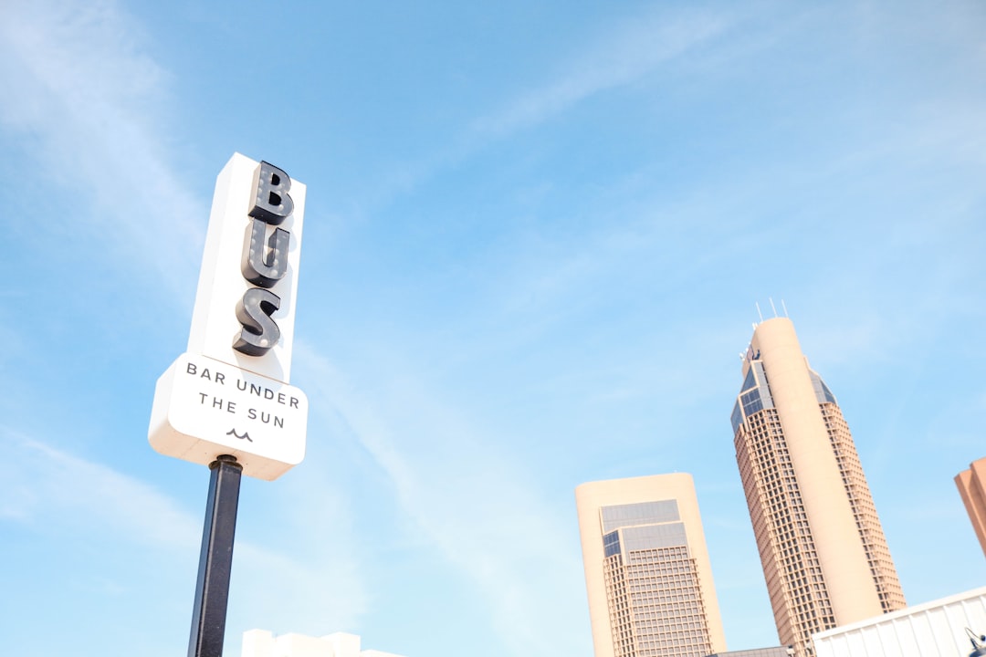 DALL·E 3 生成的一张包含清晰英文文字招牌的城市街景插画，对比 DALL·E 2 经常出现乱码文字的画面-1